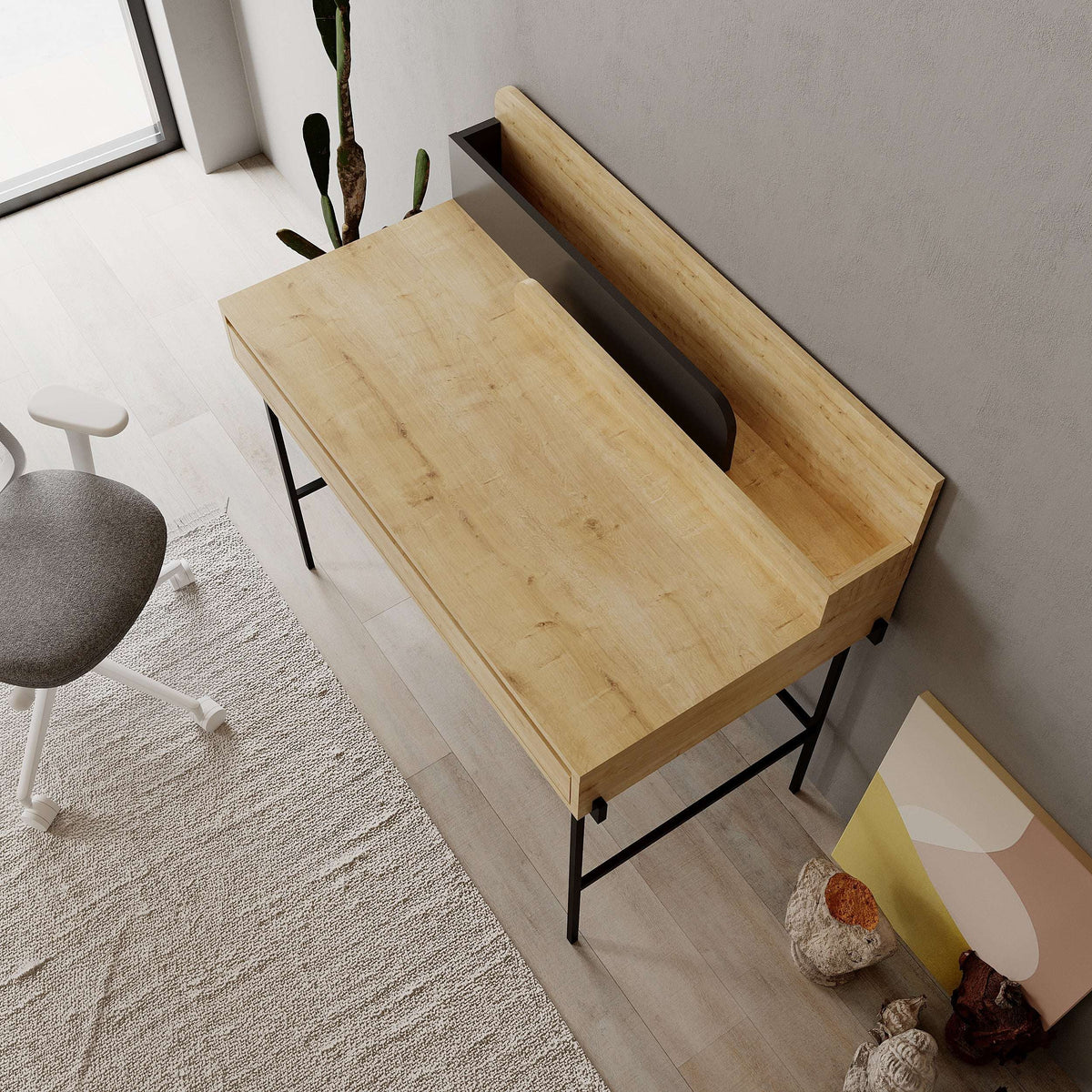 Light wood modern desk with open side shelf and black metal legs on carpet
