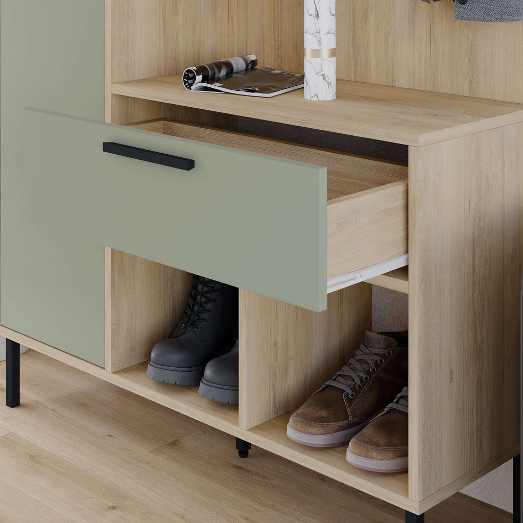 Oak hall stand with open shoe cubbies and a light green drawer front