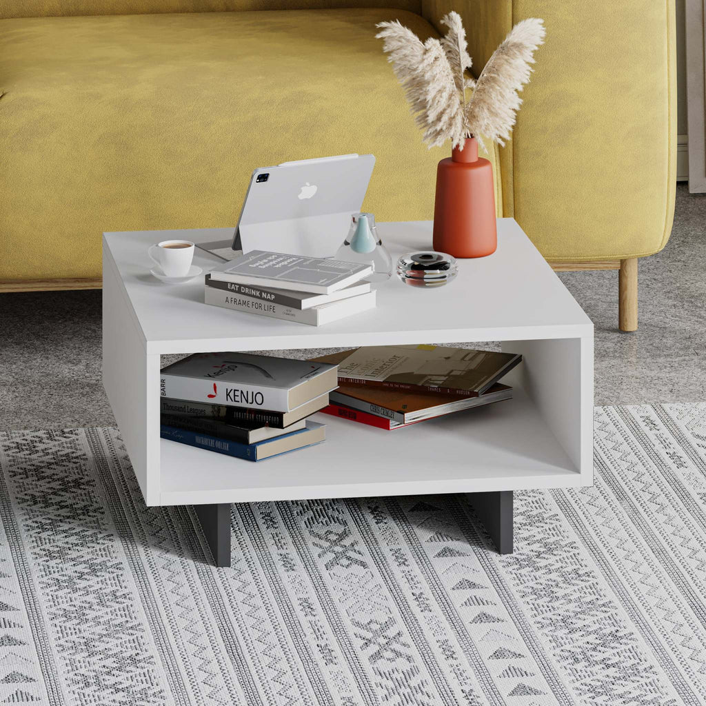 Modern coffee table in white with open center shelf and square legs