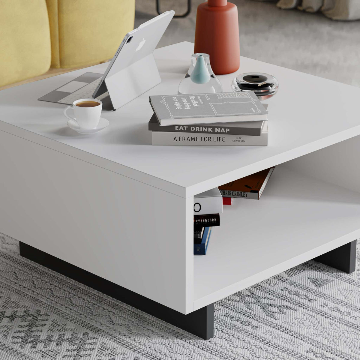 White modern coffee table with open lower shelf and squared profile legs
