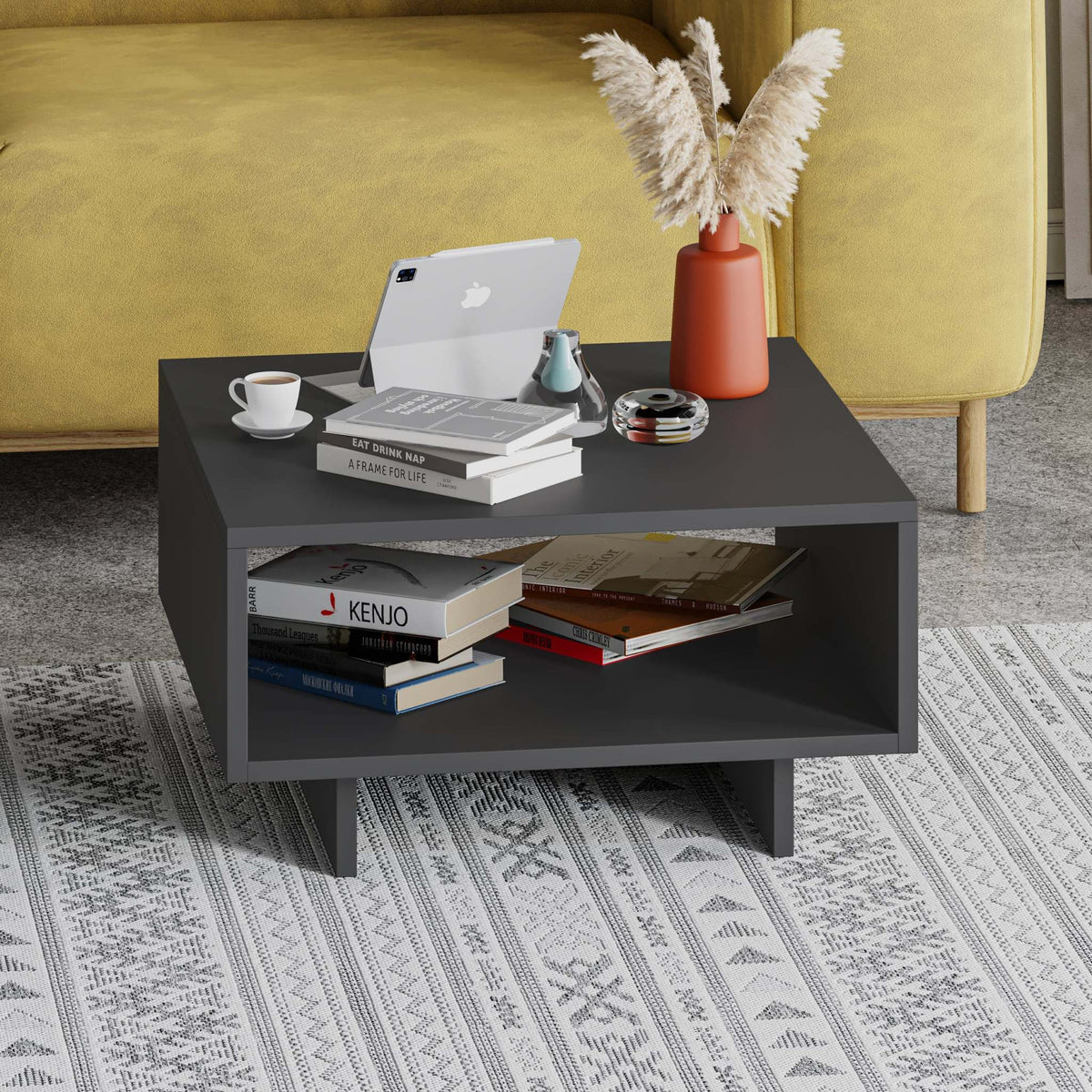Modern coffee table in dark anthracite with open center shelf and sturdy legs