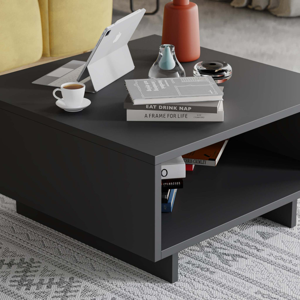 Modern coffee table in dark anthracite with open lower shelf and square legs