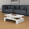 Grey multipurpose coffee table with open shelves and raised tabletop, 27.5 cm high.