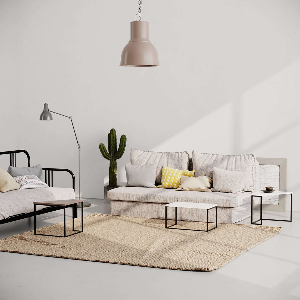Multipurpose coffee table with black metal frame and clear glass tabletop