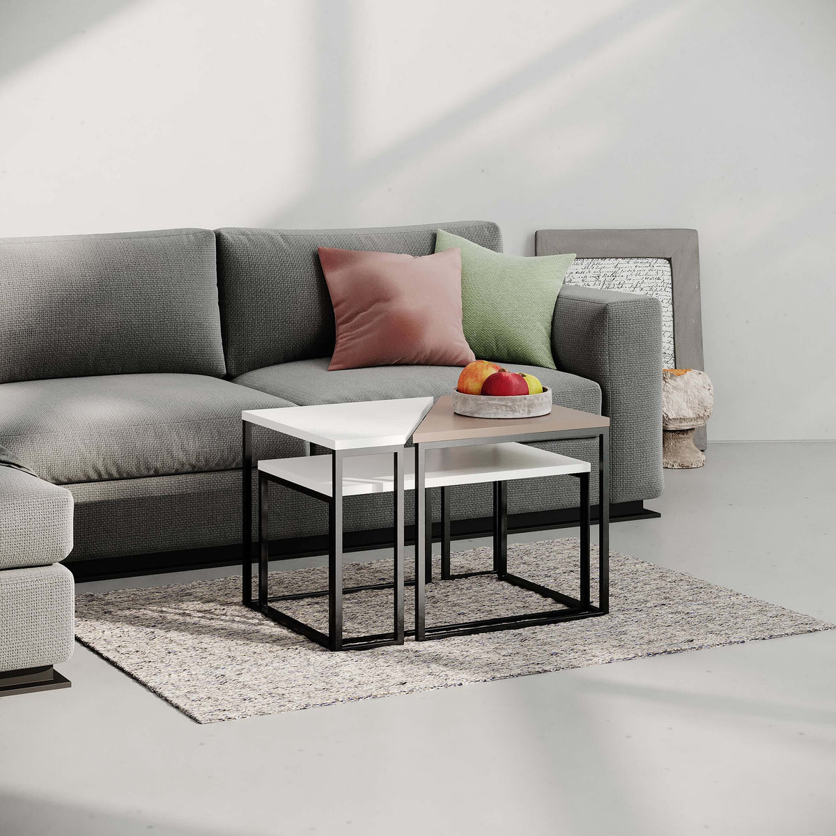Modern coffee table with white top and black metal frame, styling on a rug
