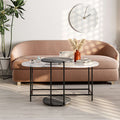 Nested coffee table set with round marble-look top, dark metal frame, lower round nesting top