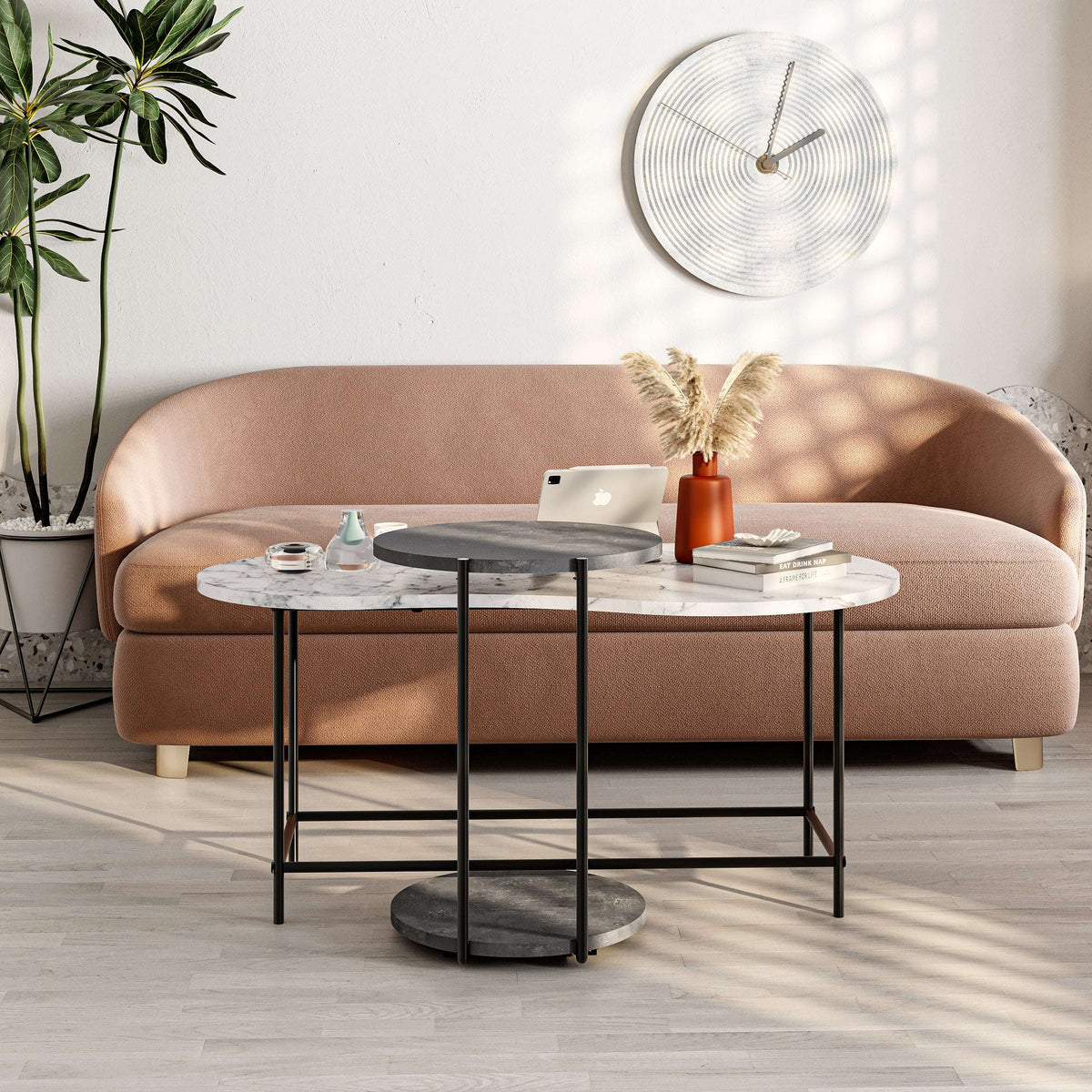 Nested coffee table set with round marble-look top, dark metal frame, lower round nesting top