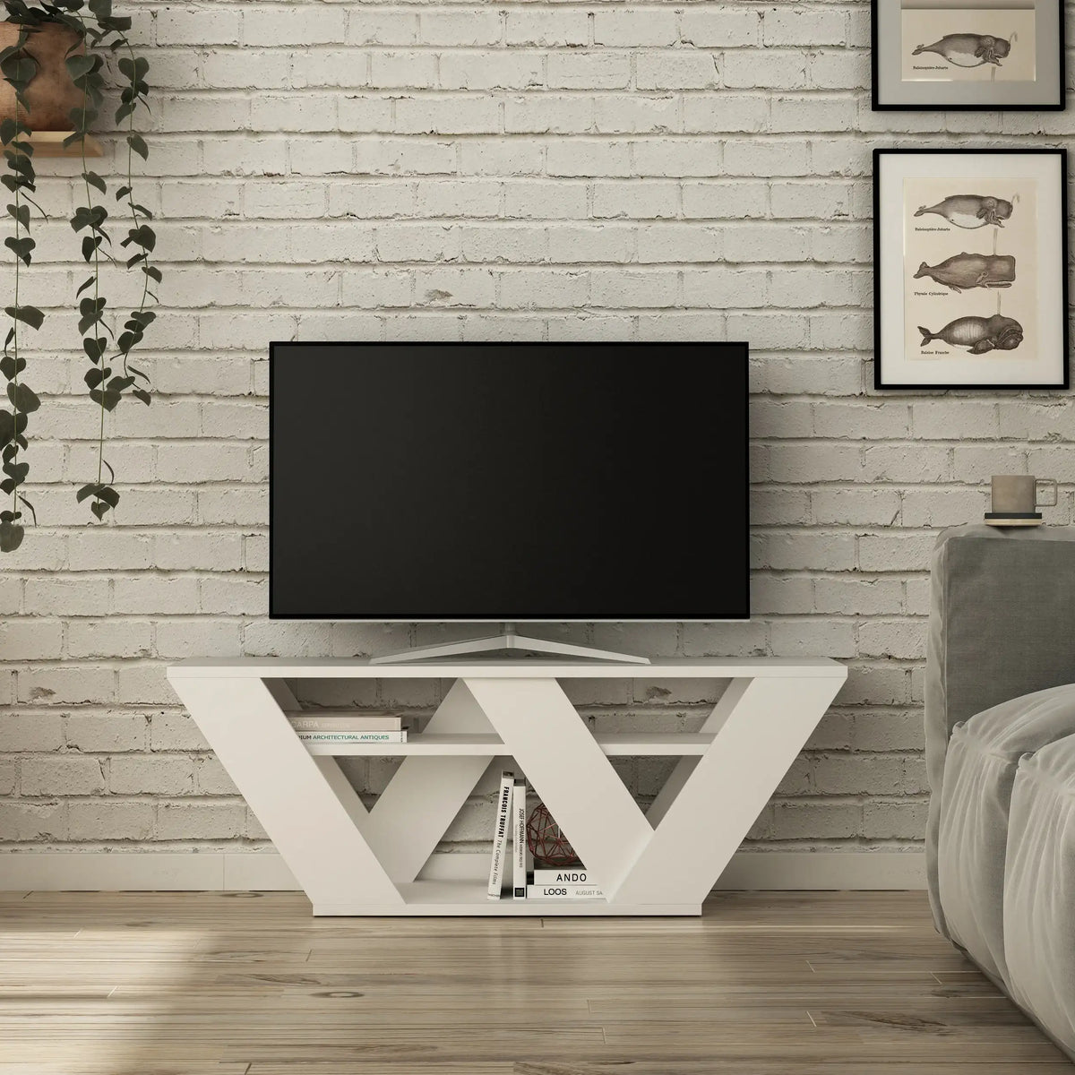 White modern TV stand with open V-shaped storage and drawer