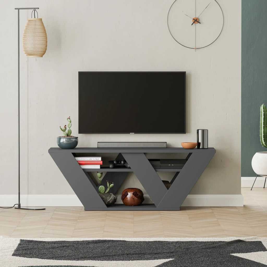 Modern dark gray TV stand with triangular open shelves and media compartments