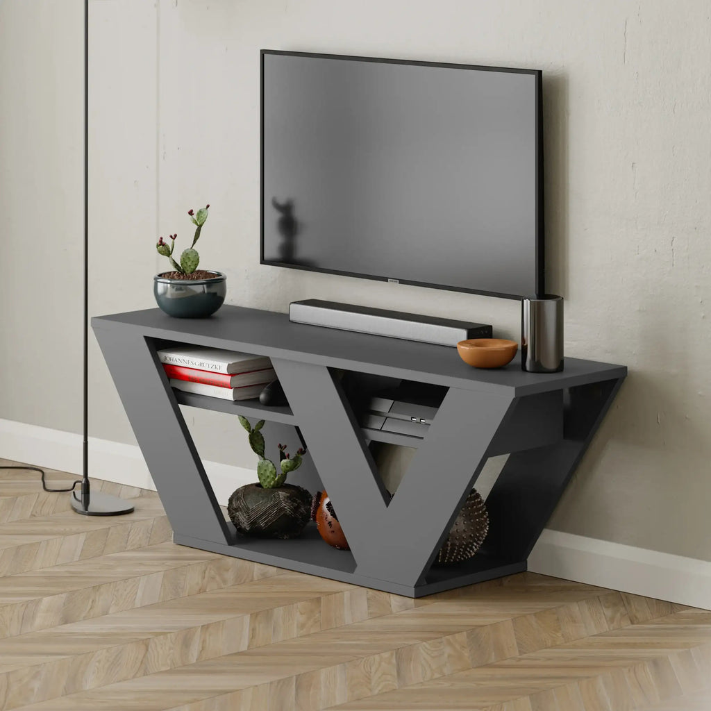 Modern dark gray TV stand with triangular open shelves and center drawer