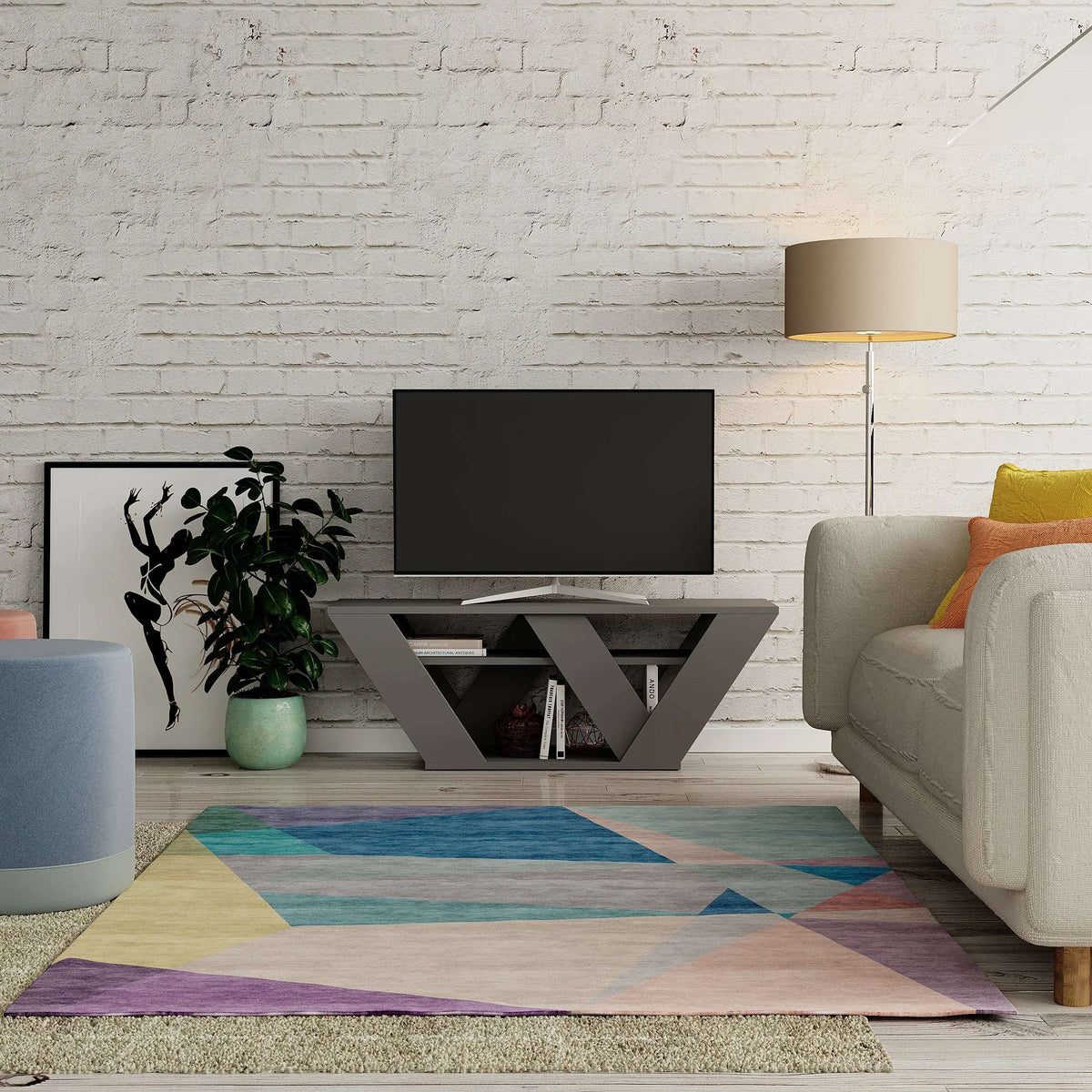 Modern white TV stand with open V-shaped shelves and pull-out drawer