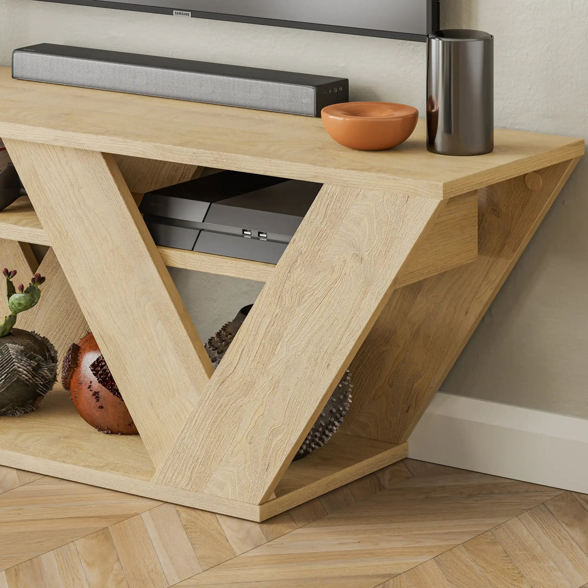 Modern light wood TV stand with triangular open shelves and center drawer