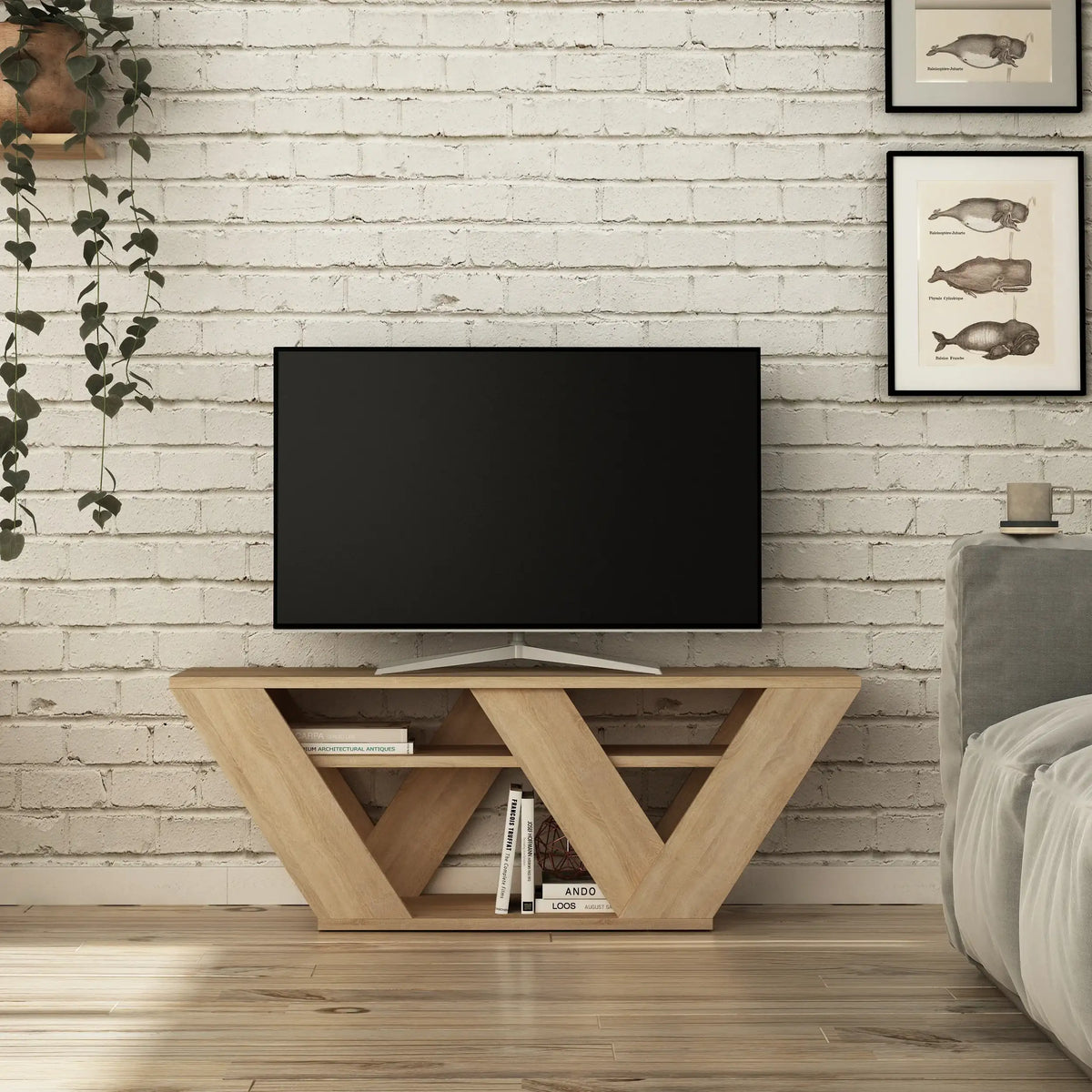 Modern light wood TV stand with open triangular shelving and front drawers