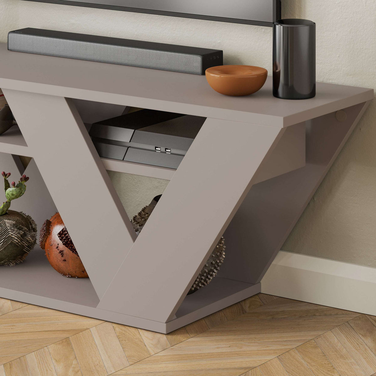 Sandstone TV stand with open drawer, shelf, and metal handle in geometric base