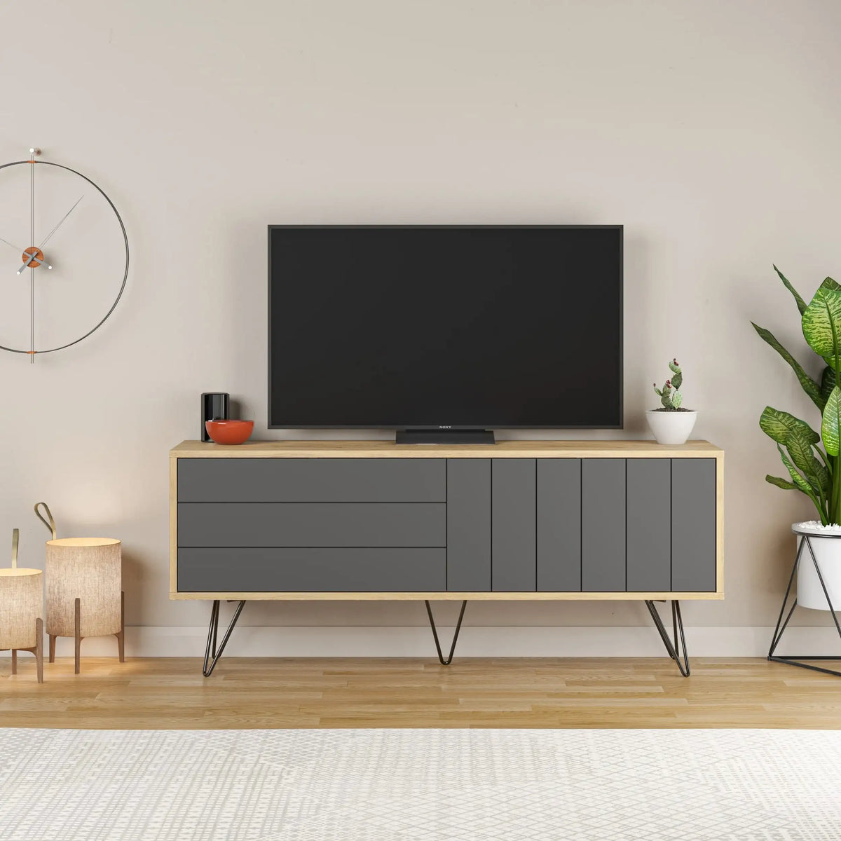 Modern TV stand with storage cabinet, anthracite cabinet and dark TV screen