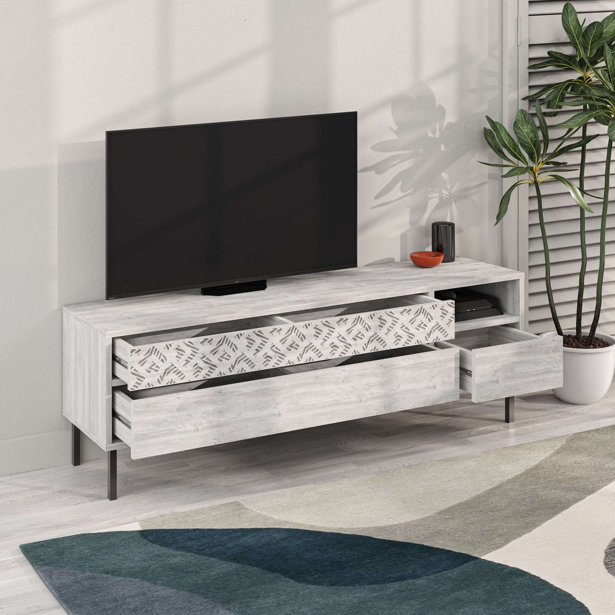 Modern TV stand with storage drawers, whitewash finish and patterned front panel