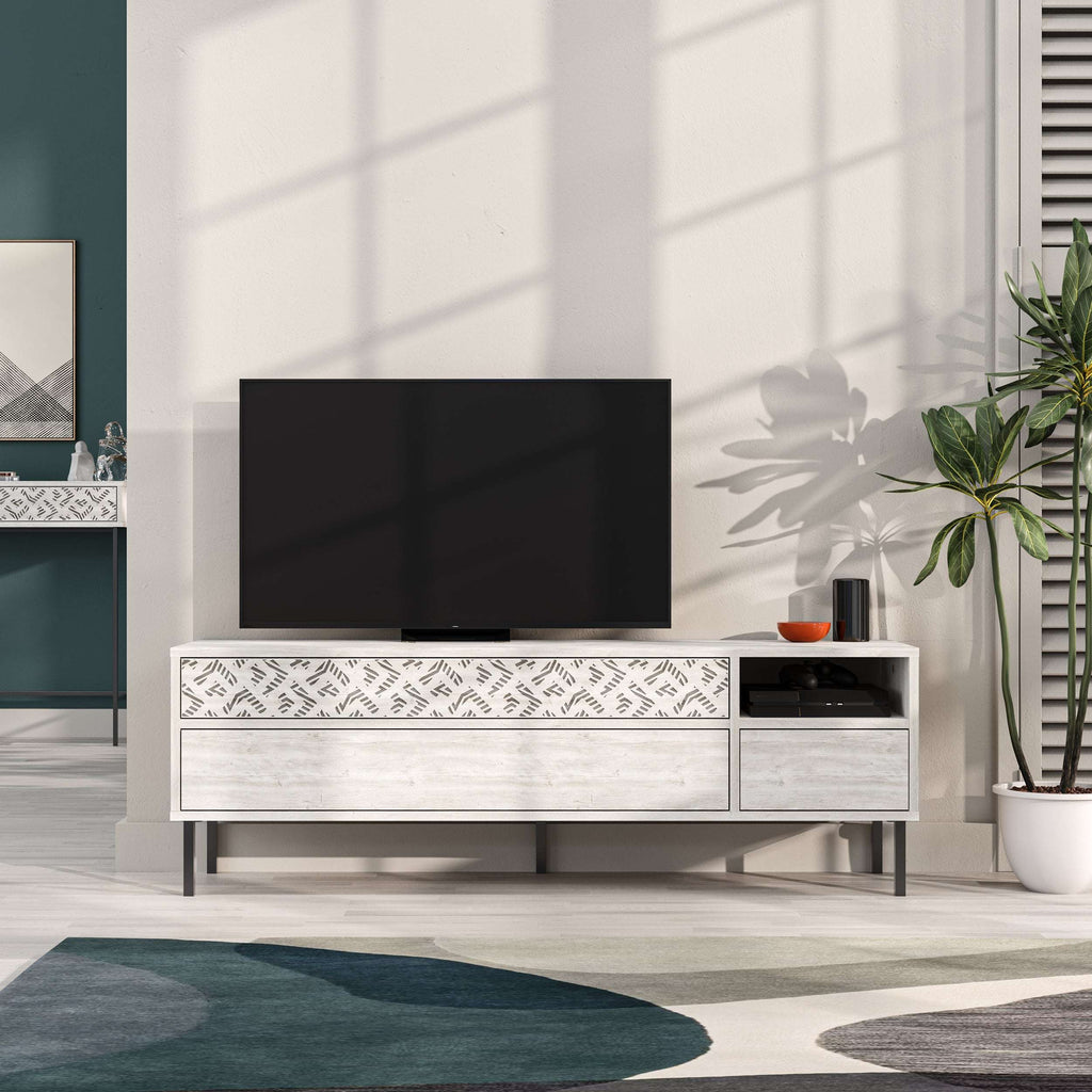 White TV stand with patterned top drawer, open media compartment, and storage drawers