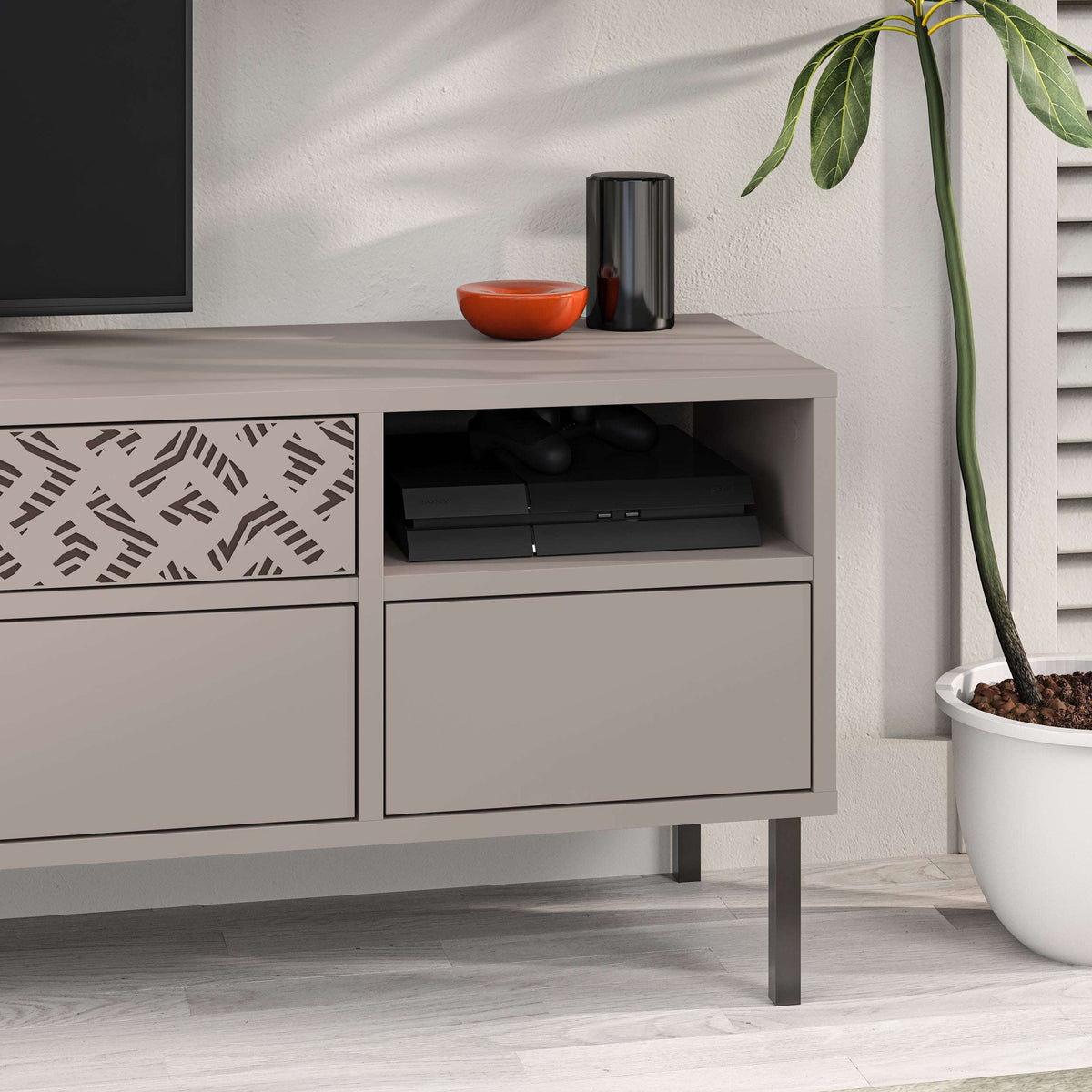 Grey TV stand side view with patterned drawer inserts and open media storage