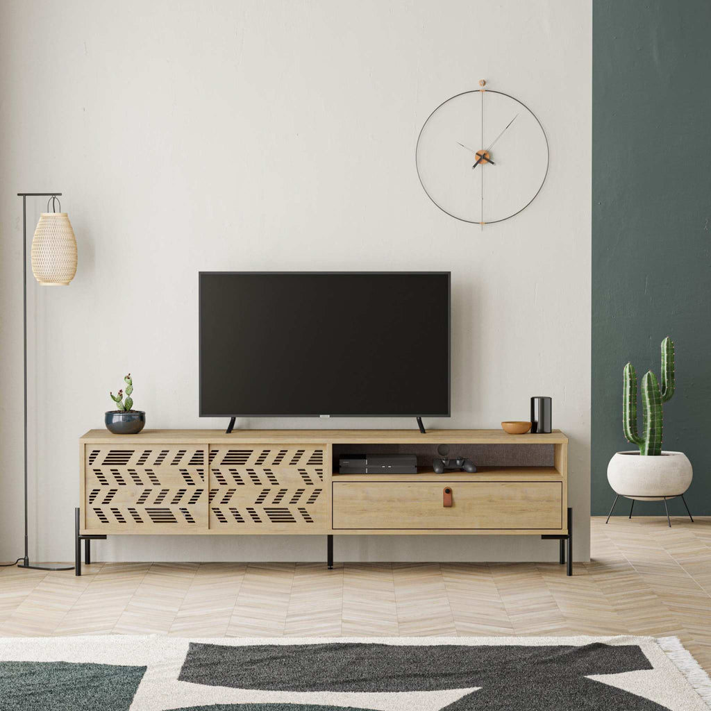 Modern TV stand with patterned cabinet doors, media shelf, and center drawer