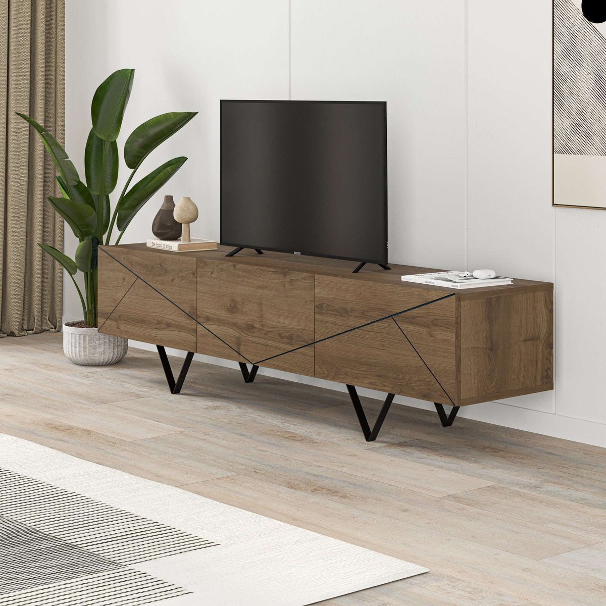 Dark oak TV cabinet with black legs, geometric blue accents, and drawer storage