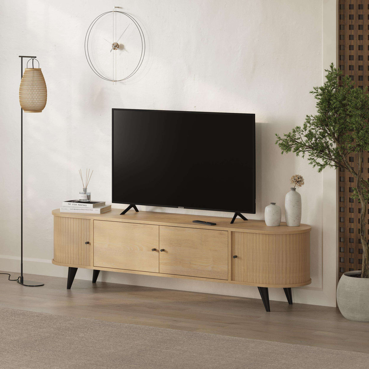Oak TV stand with 4 cabinet doors, curved sides, and dark tapered legs