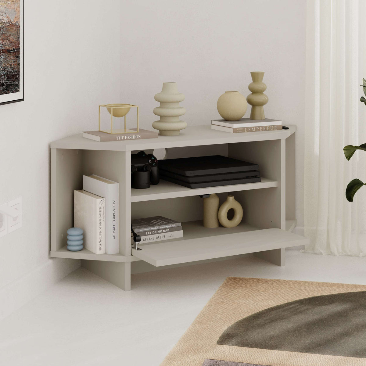 White corner TV console with three open shelves and lower cabinet area