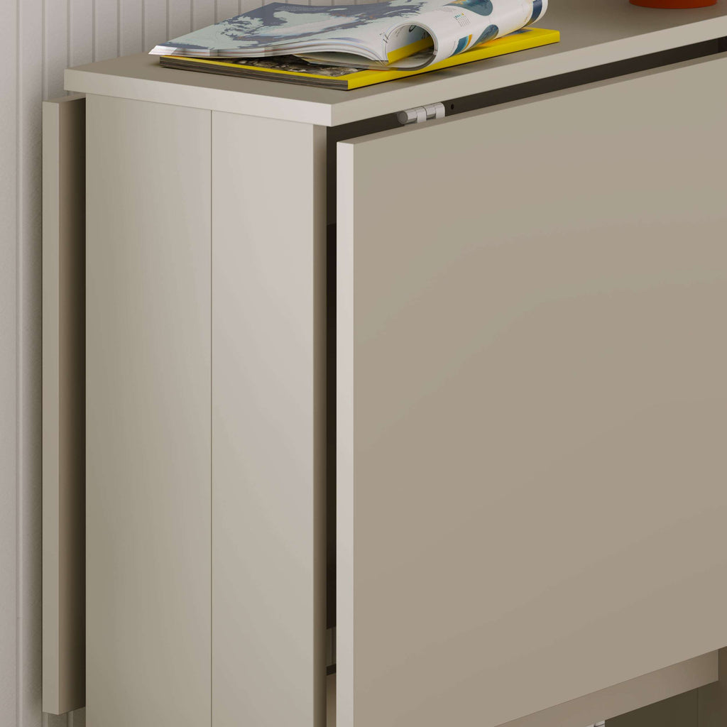 Foldable dining table side view with smooth sandstone beige panels and thick frame.