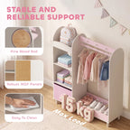 Pink kids wardrobe unit with hanging rail, side shelves, and fabric drawer; stable supports.