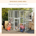 Light grey outdoor cat enclosure with wire mesh walls and platforms, cats seen inside.
