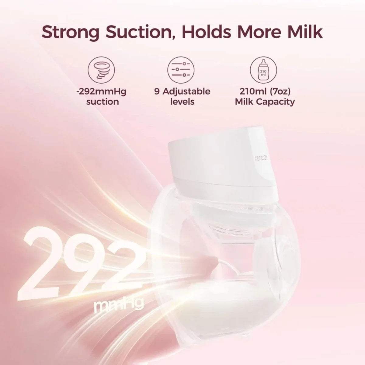 White wearable electric breast pump with control panel on top and transparent cup