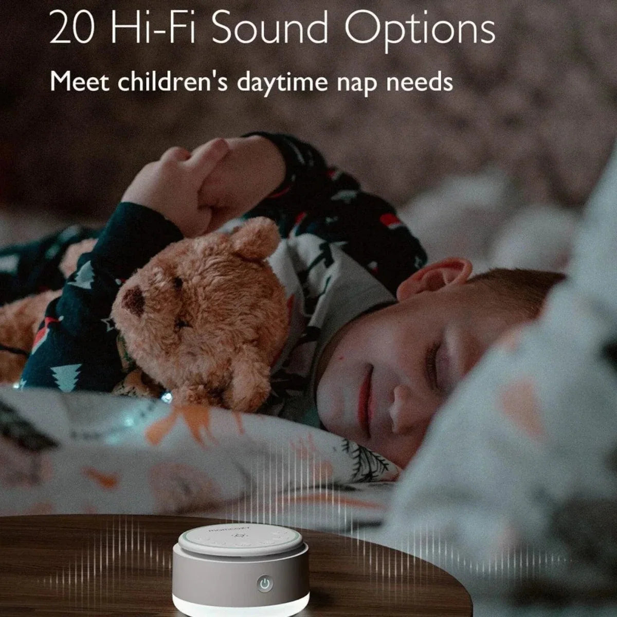 White Momcozy white noise machine on a bedside table, small circular top panel