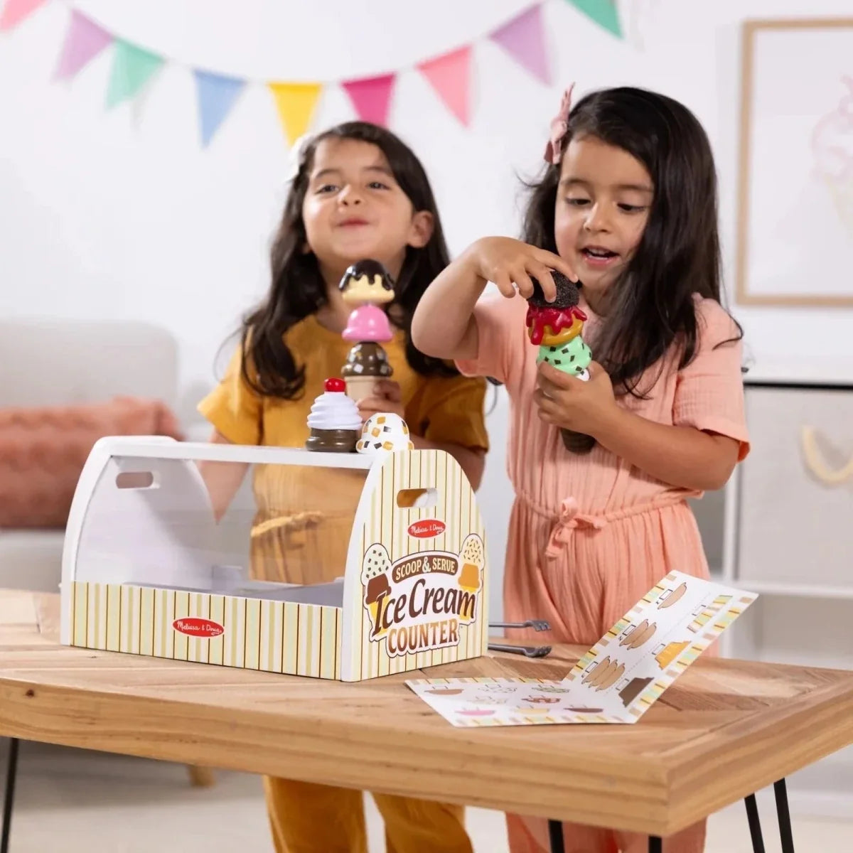 Wooden ice cream counter play set with toy cones and scoops