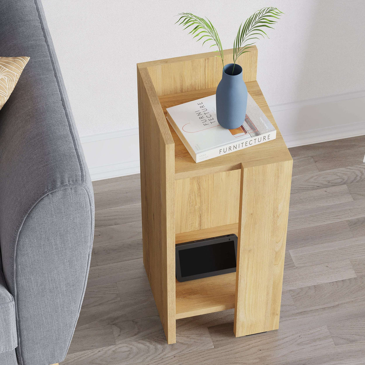 Narrow left bedside table module in light oak with top shelf and lower open compartment