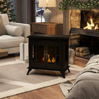 Black freestanding bioethanol stove with burning flame, angled front view