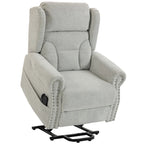 Light grey chenille power lift recliner chair with padded arms and studded trim.