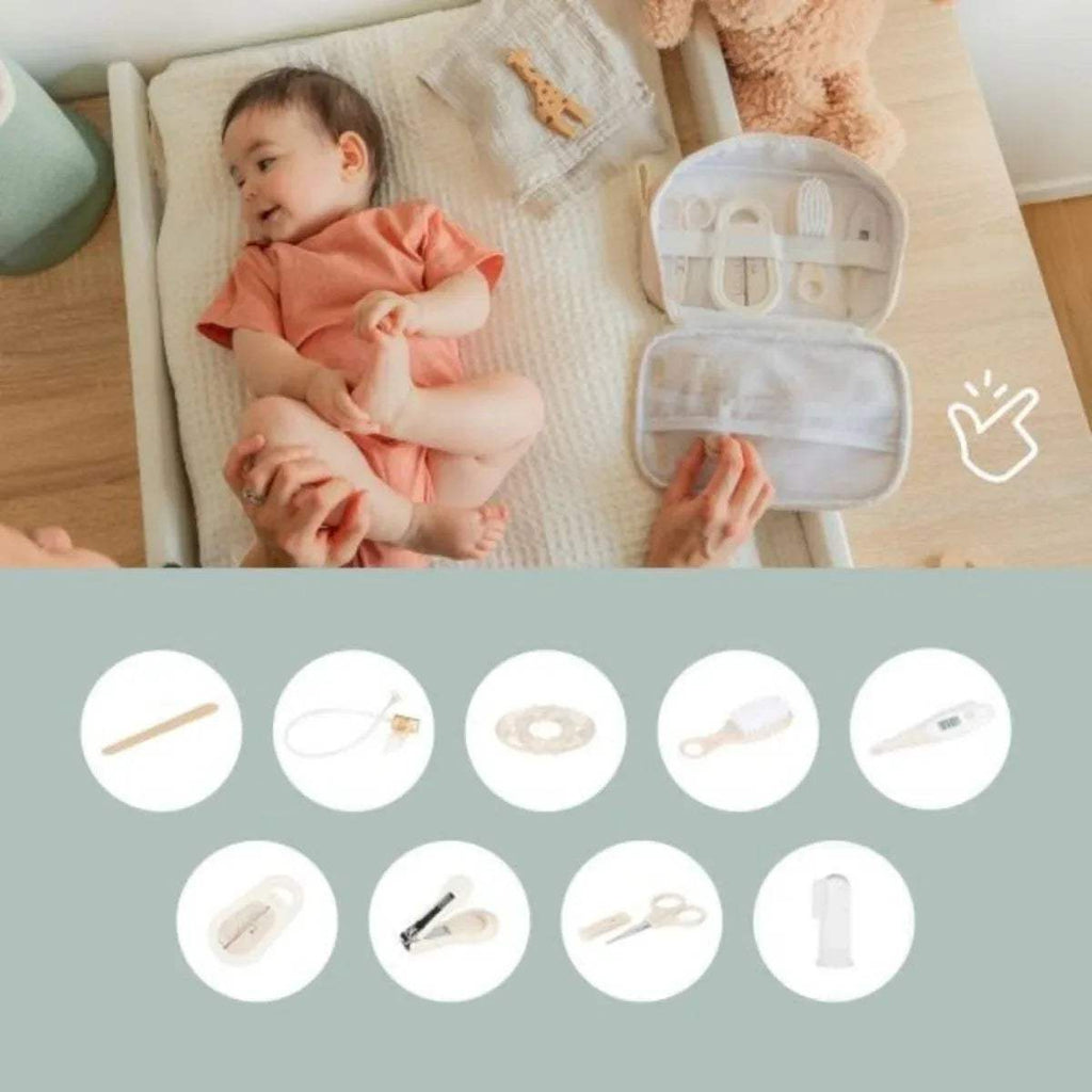 Baby grooming set case open with hairbrush, comb, and small grooming tools