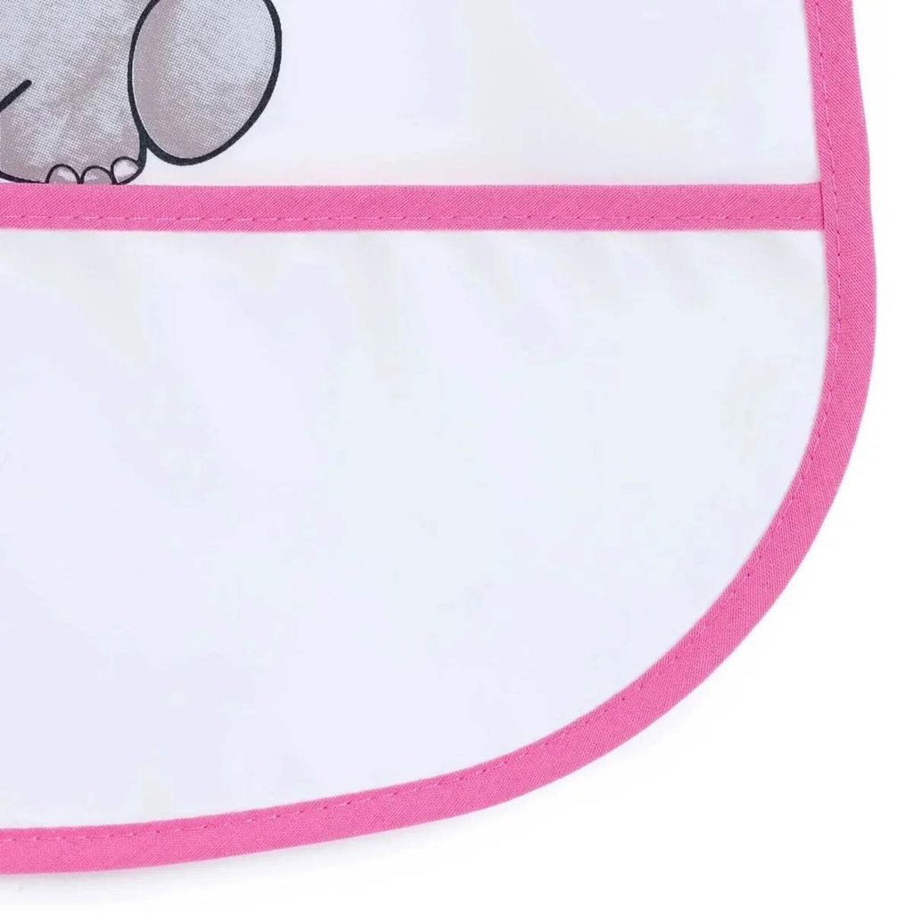 Close-up of white bib front with pink trim and stitched seam detail.
