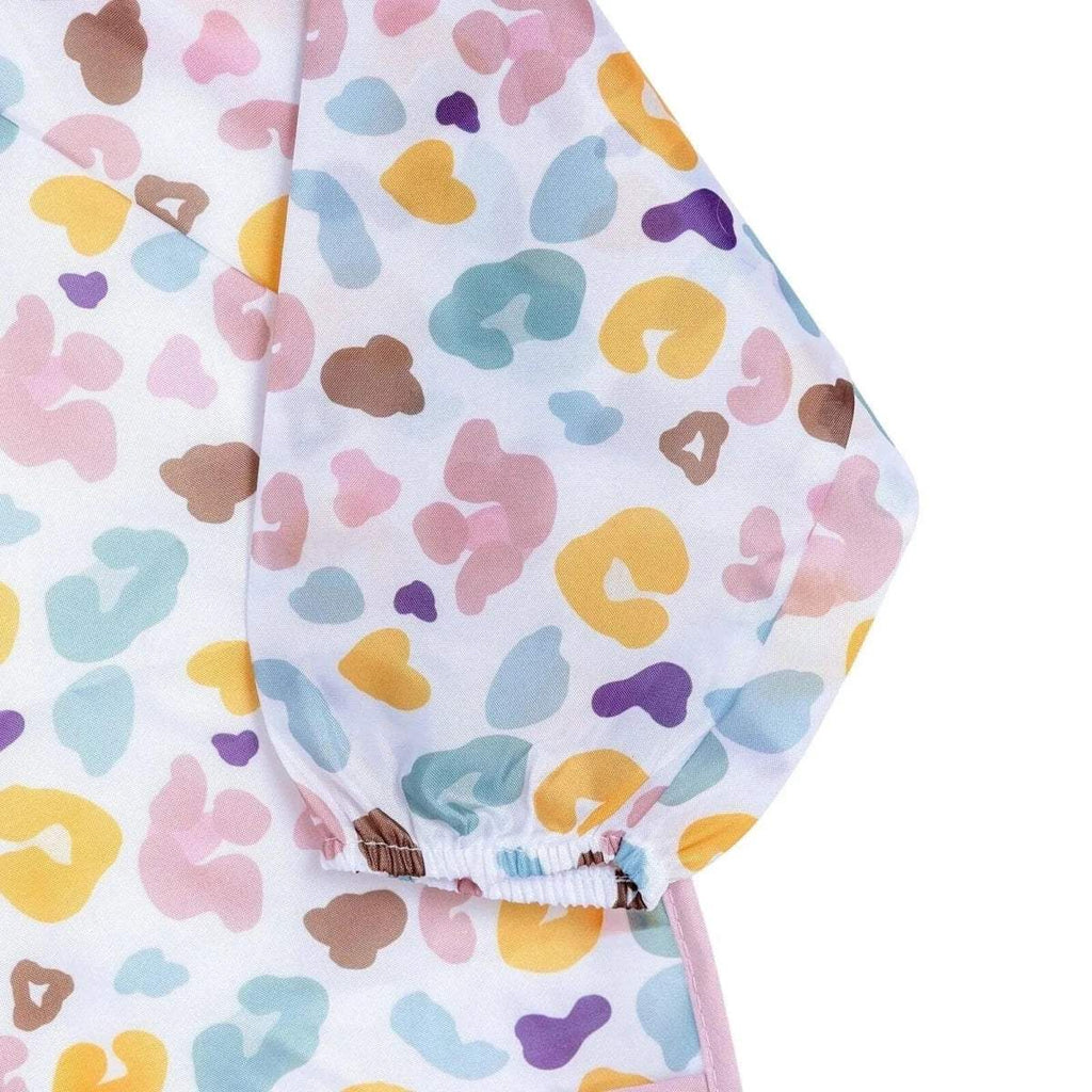 Baby coverall bib sleeve close-up with multicolor pattern and gathered elastic cuff