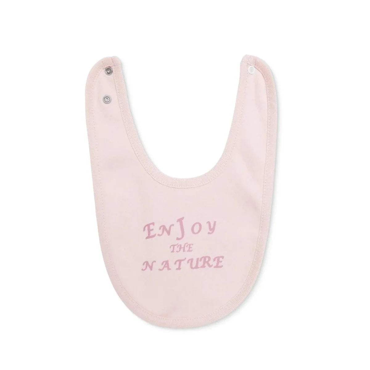 Light pink baby bib with embroidered-style text design at the center and snap button.