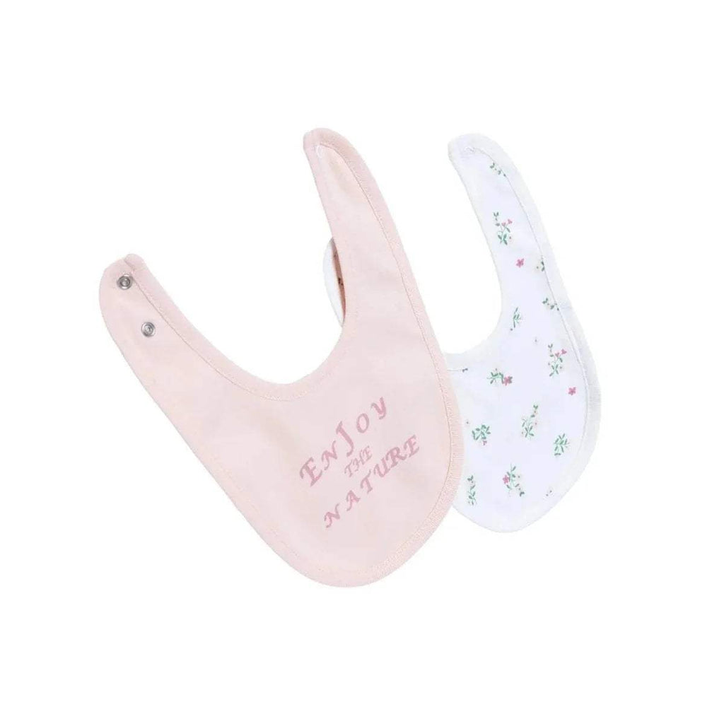 Two baby bibs together: light pink bib with text and white bib with floral pattern.