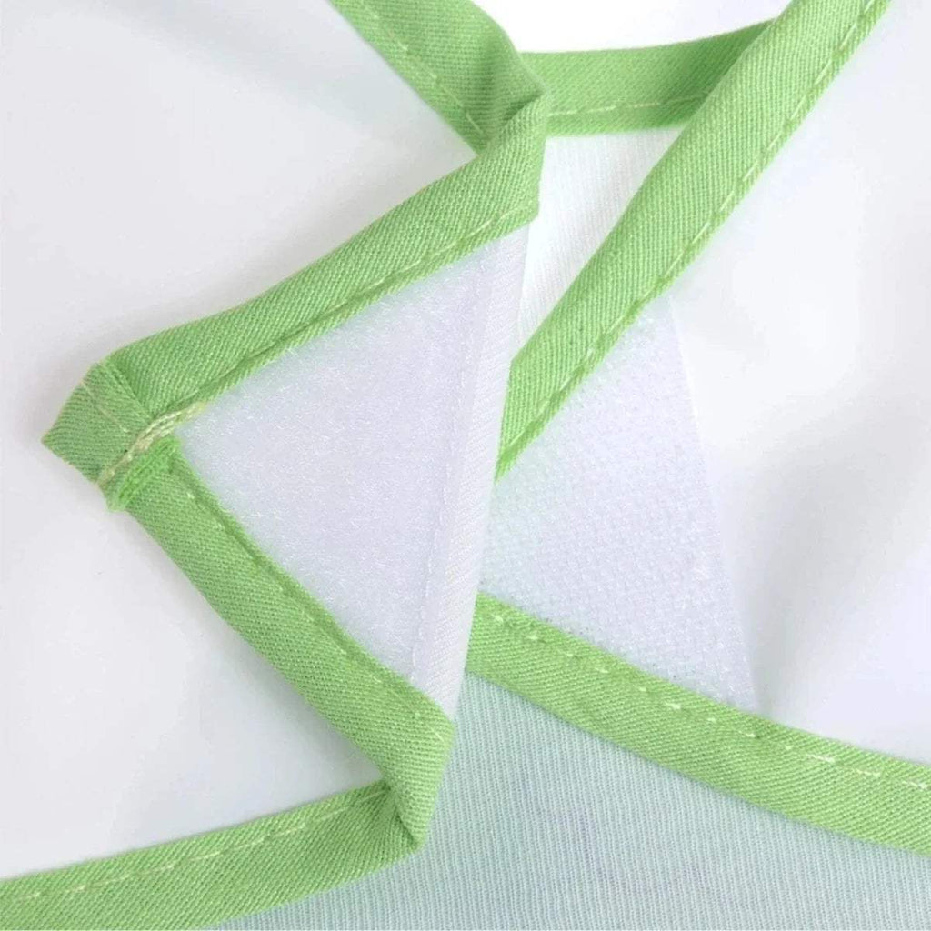 Wipe-clean bib adjustable tie with green binding and stitched edge