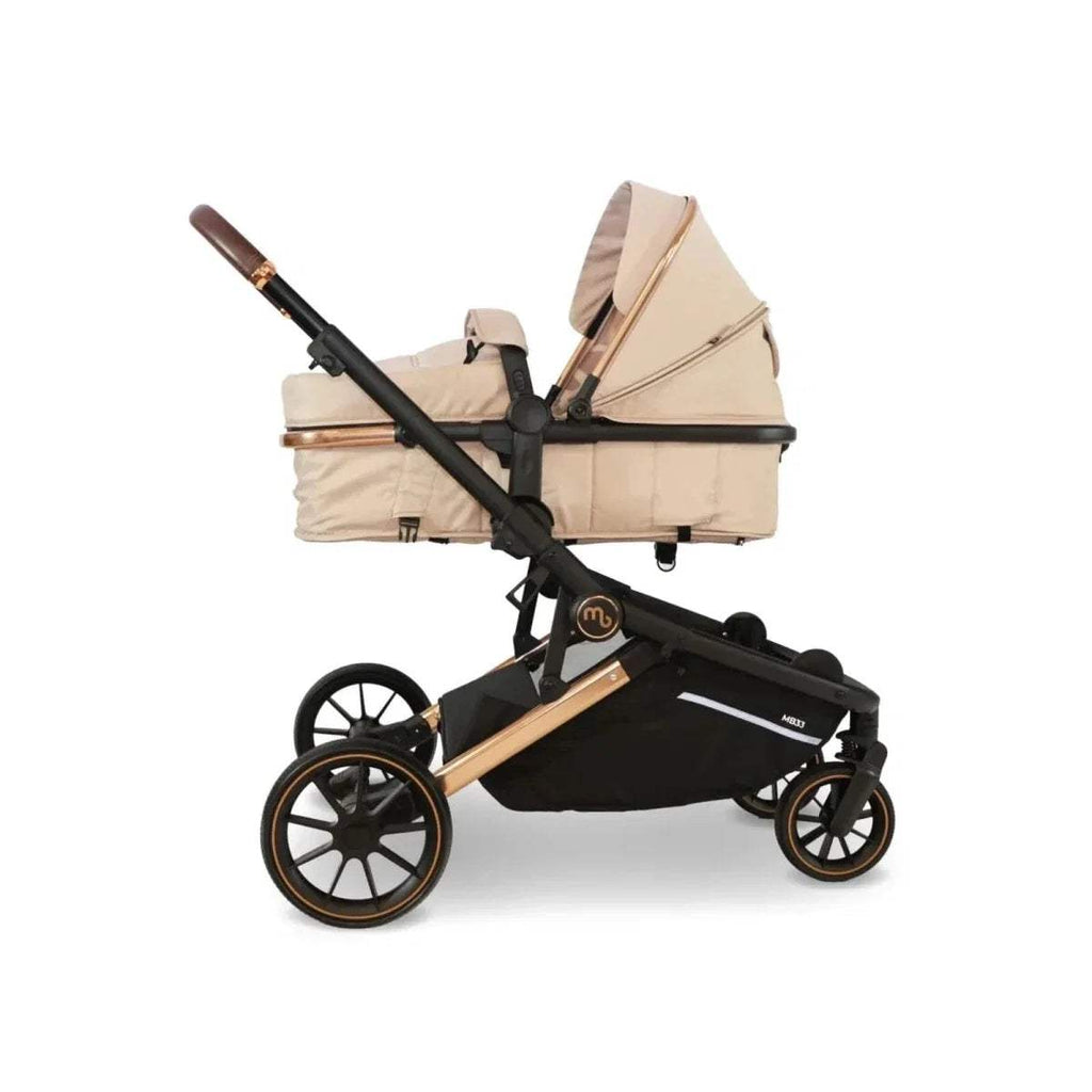 Tandem pushchair three-quarter view with beige giraffe-print seat units and black wheels