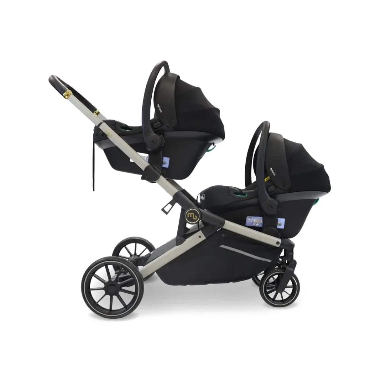 Black tandem pushchair with two seats, black canopies, and ivory frame trim