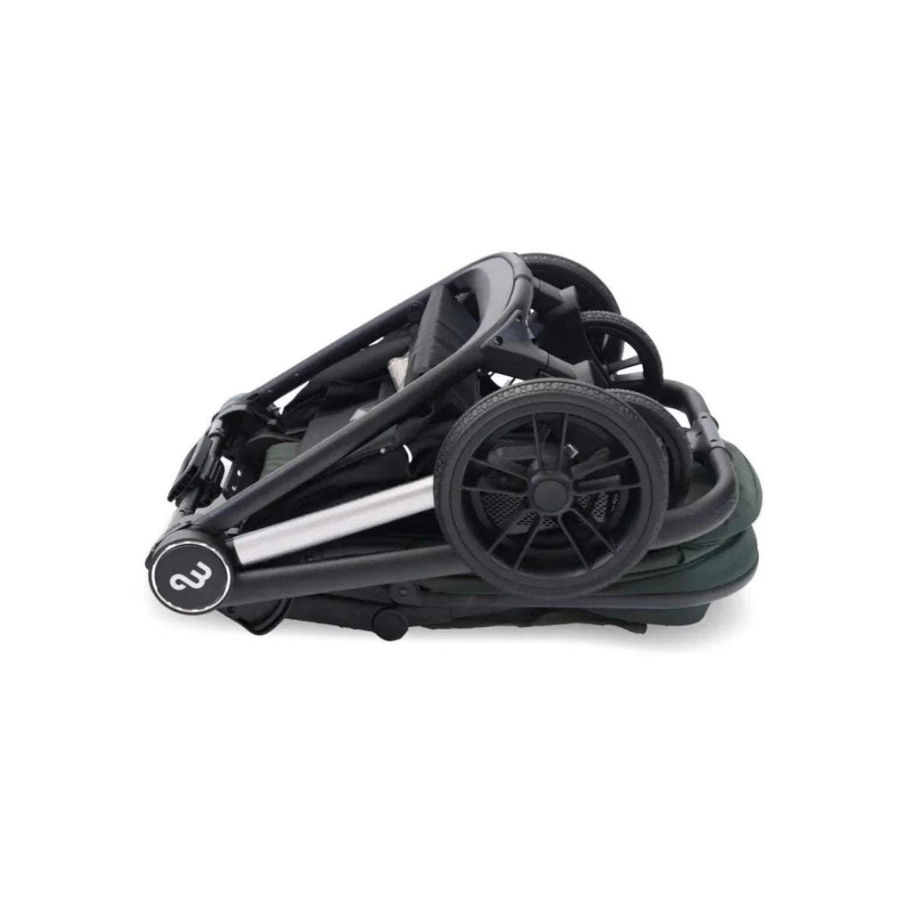 Folded stroller base with black frame, large wheels, and storage cover