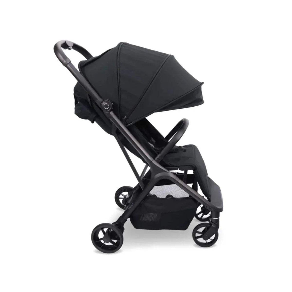 Black compact stroller with canopy and padded seat, four-wheel base
