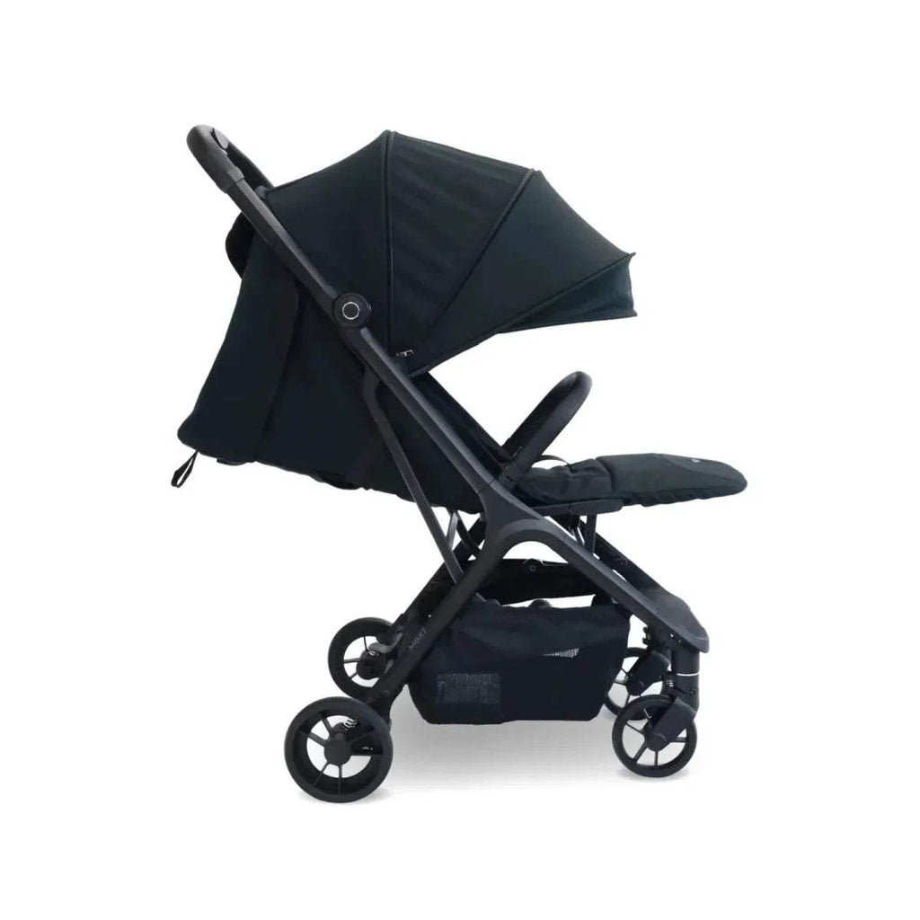 Black compact stroller with extended canopy and reclining seat, front wheel view