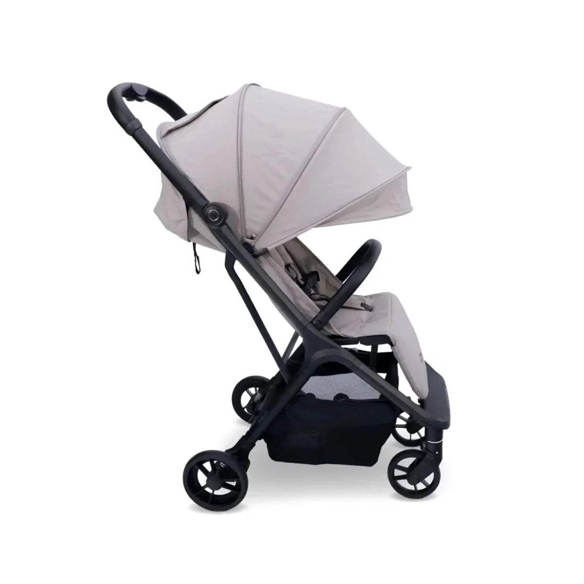 Camel compact stroller angled view with extended canopy and rear storage basket