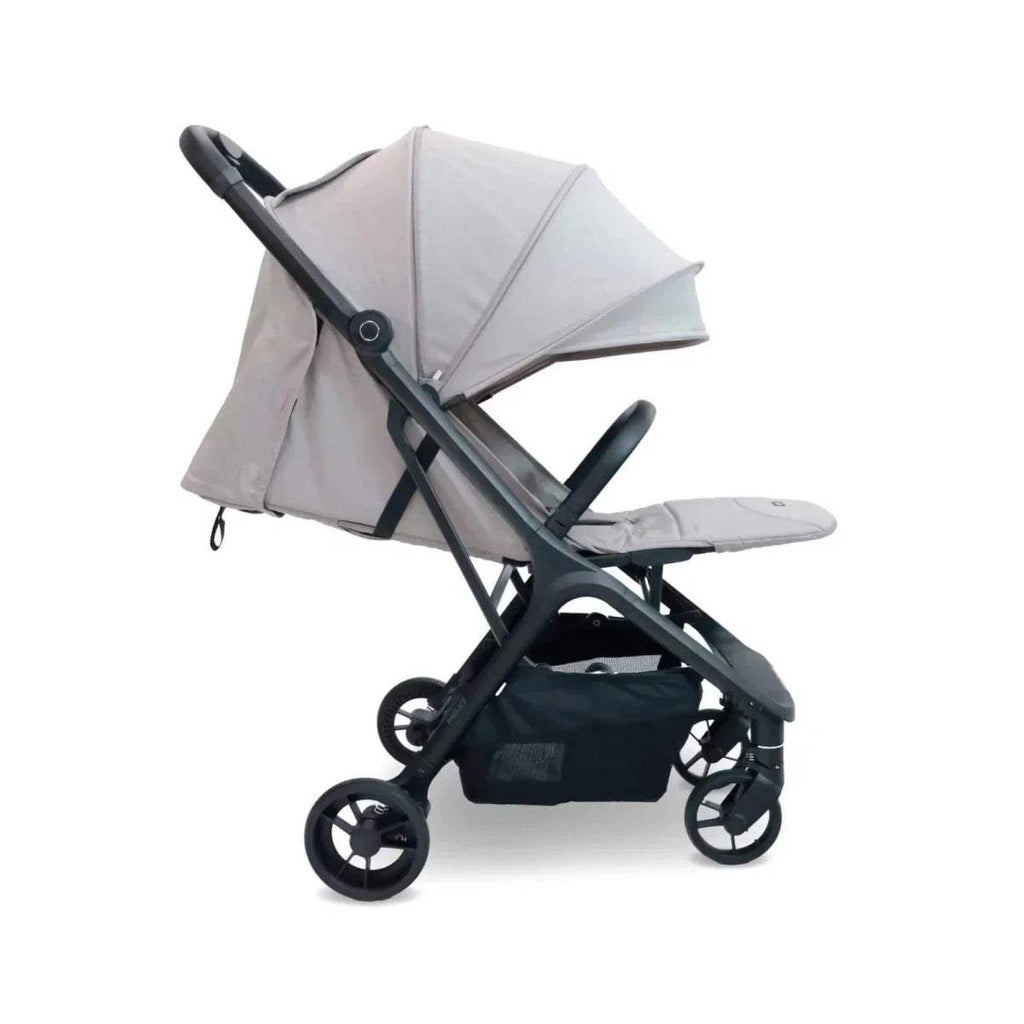 Camel compact stroller reclined seat with canopy and foldable frame, side angle