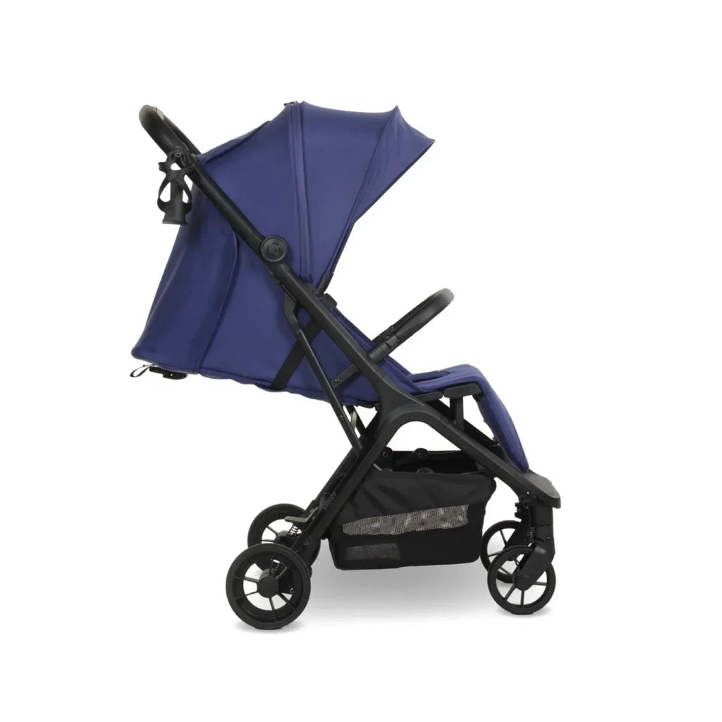 Indigo compact stroller in side view with canopy, safety bar, and multi-position wheels