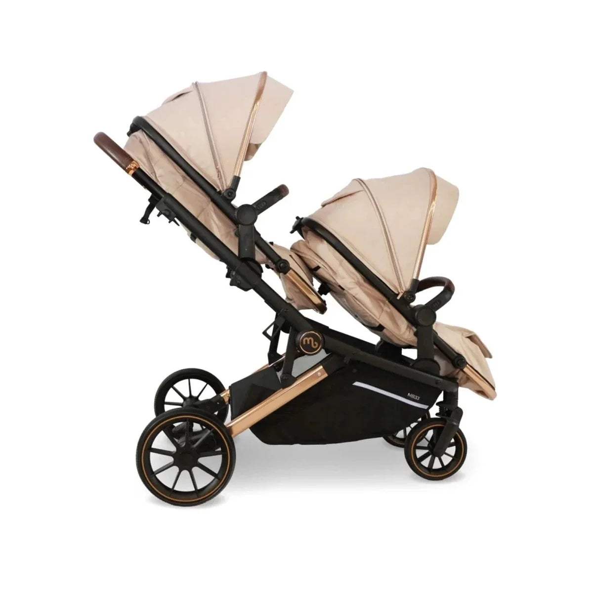 Twin stroller travel system with two beige seat units, canopies, and black frame